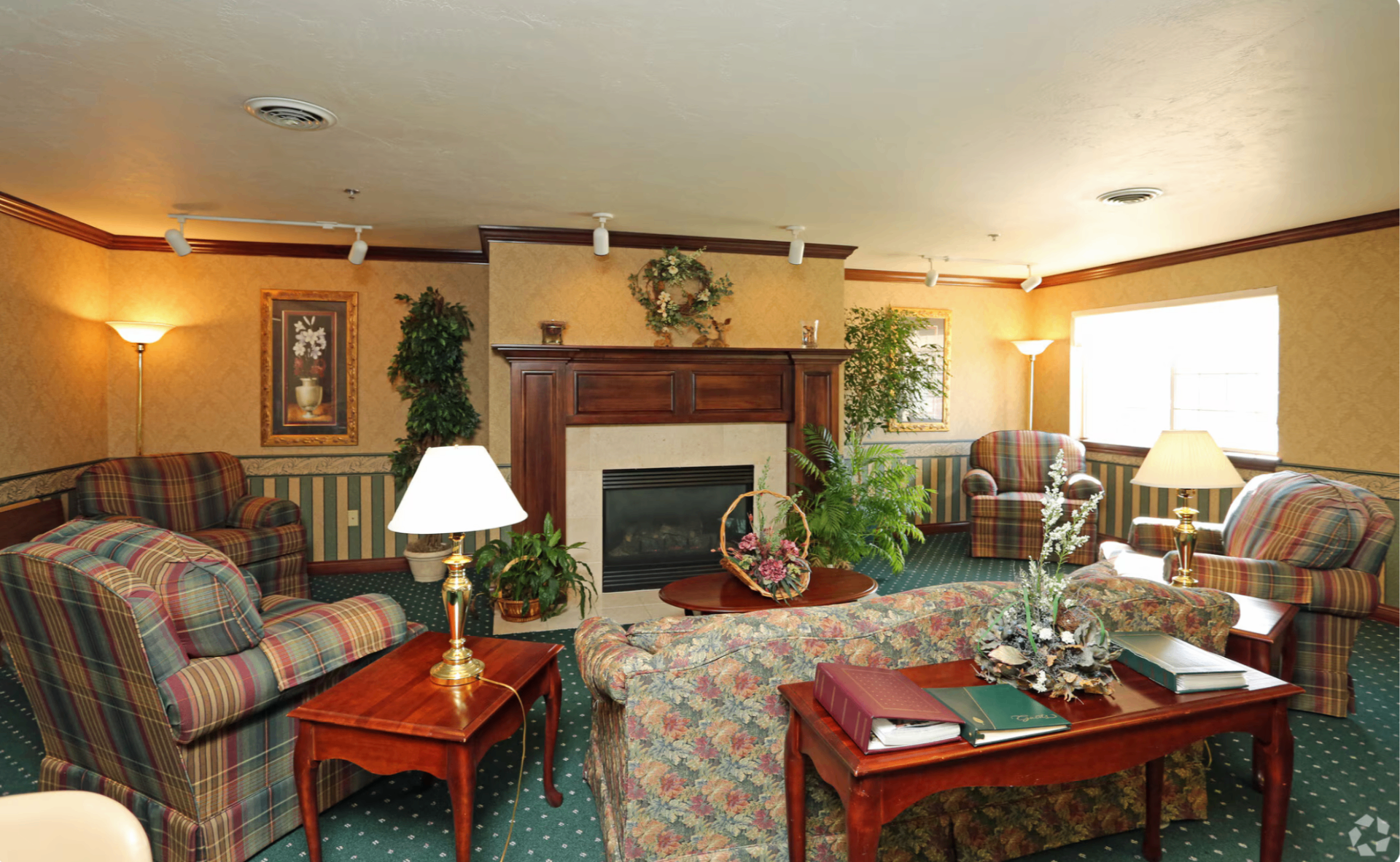 Southbrook Manor community room with fireplace
