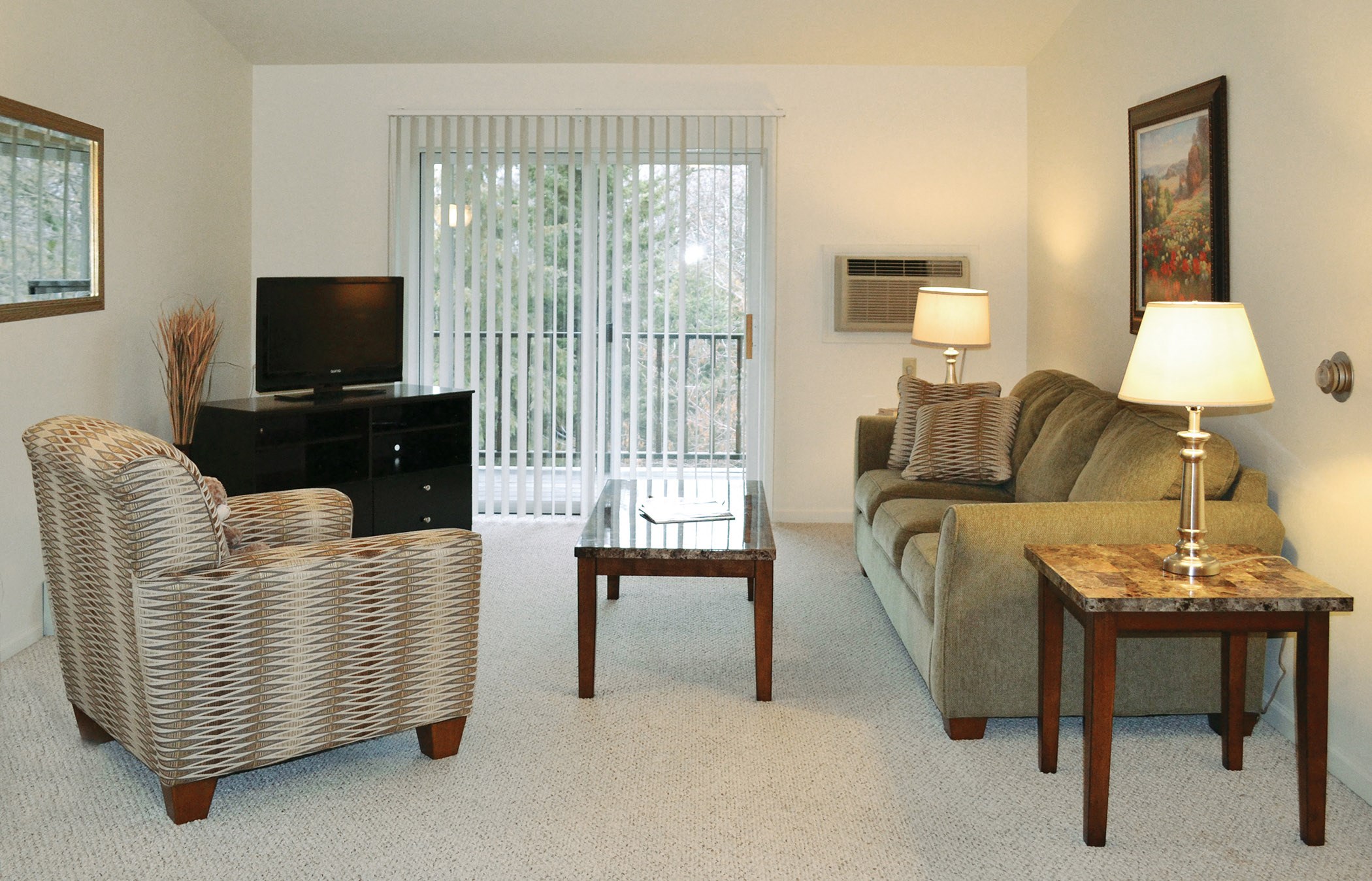 Bright modern senior apartment living room at Southbrook Manor